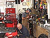 06. While Jack builds the bash plate, Ken begins installing the Footrest guards..jpg