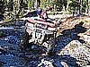 018. Goin' nowhere.  Look at Dusty's rear tire..it's on a sheet of ice..jpg