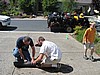 006. Terry and Dusty roll up my stuff for me...Mow my lawn next..jpg