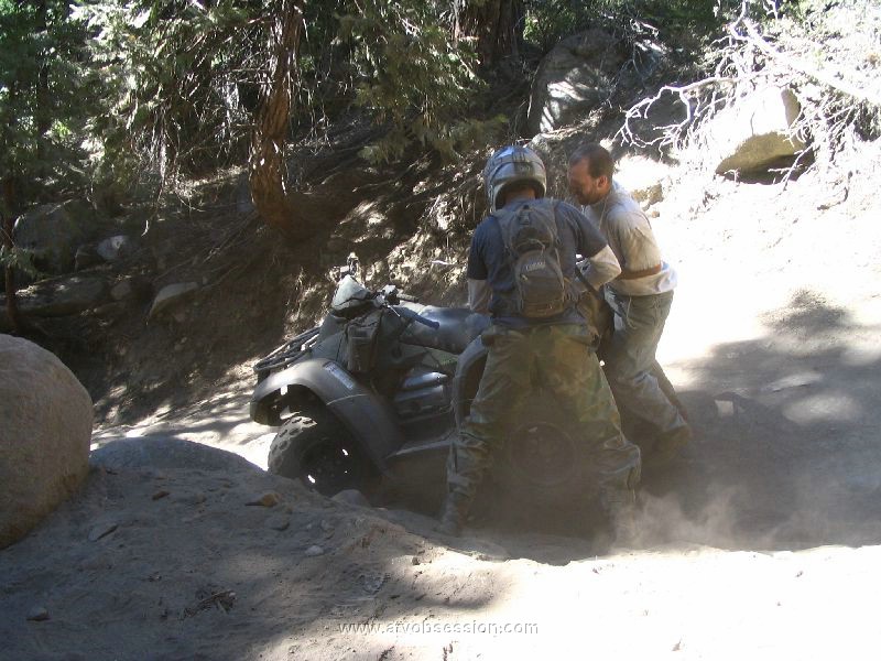 09. Terry helps Dusty flip his ATV over...DOH!.jpg