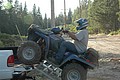 22. Chadd doing the usual..loading a CUSTOMER ATV! LOL..jpg