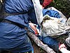 17. Larry stabilizes his broken femur with a tree..jpg