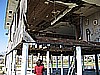 70. Lakeside, his house is smashed...and still one of the few standing..jpg