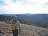 089. Joe snaps his photos...with Meadow Lake in the background..jpg
