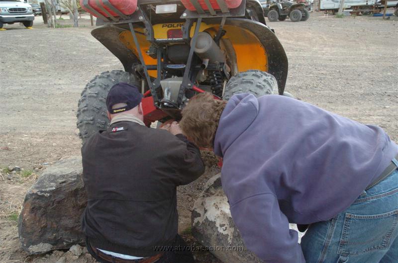 013. So Larry and Mr. Bill Can Get Under the Tore Up Polaris..jpg