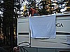 112. Bill hangs the TV sheet..jpg