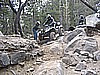 054. Derrick heads down the off-camber, while Larry helps out..jpg