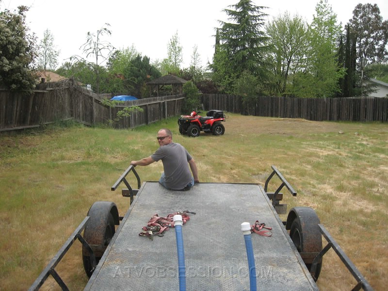 010. I pull my trailer from the backyard with Jack hitching a ride..jpg