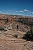 140. Ken walks to the edge and sees a couple bicyclists..jpg
