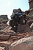 214. Dusty weaves down a rock section..jpg