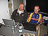 212. Back at the trailer..Larry and Dusty upload the photos to the ATVOBSESSION site..jpg
