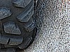 075. As close as I can get to show that tire flipping over the rim to grip that sliver of tire..jpg
