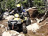 31. Larry working through the sloppy trail and boulders..jpg