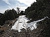 073. We start to hit some residual snow heading up to another mine..jpg