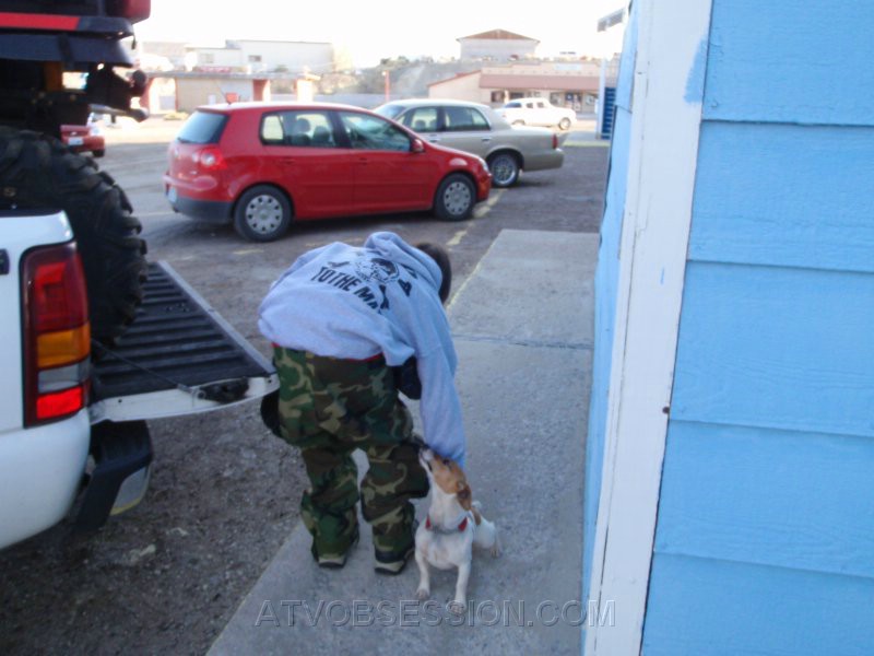 003. Kenan pets Brett's dog, Carter..jpg