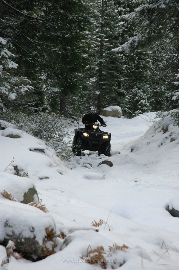 13. Debbie, Keith's wife comes up on their new King Quad 700..jpg